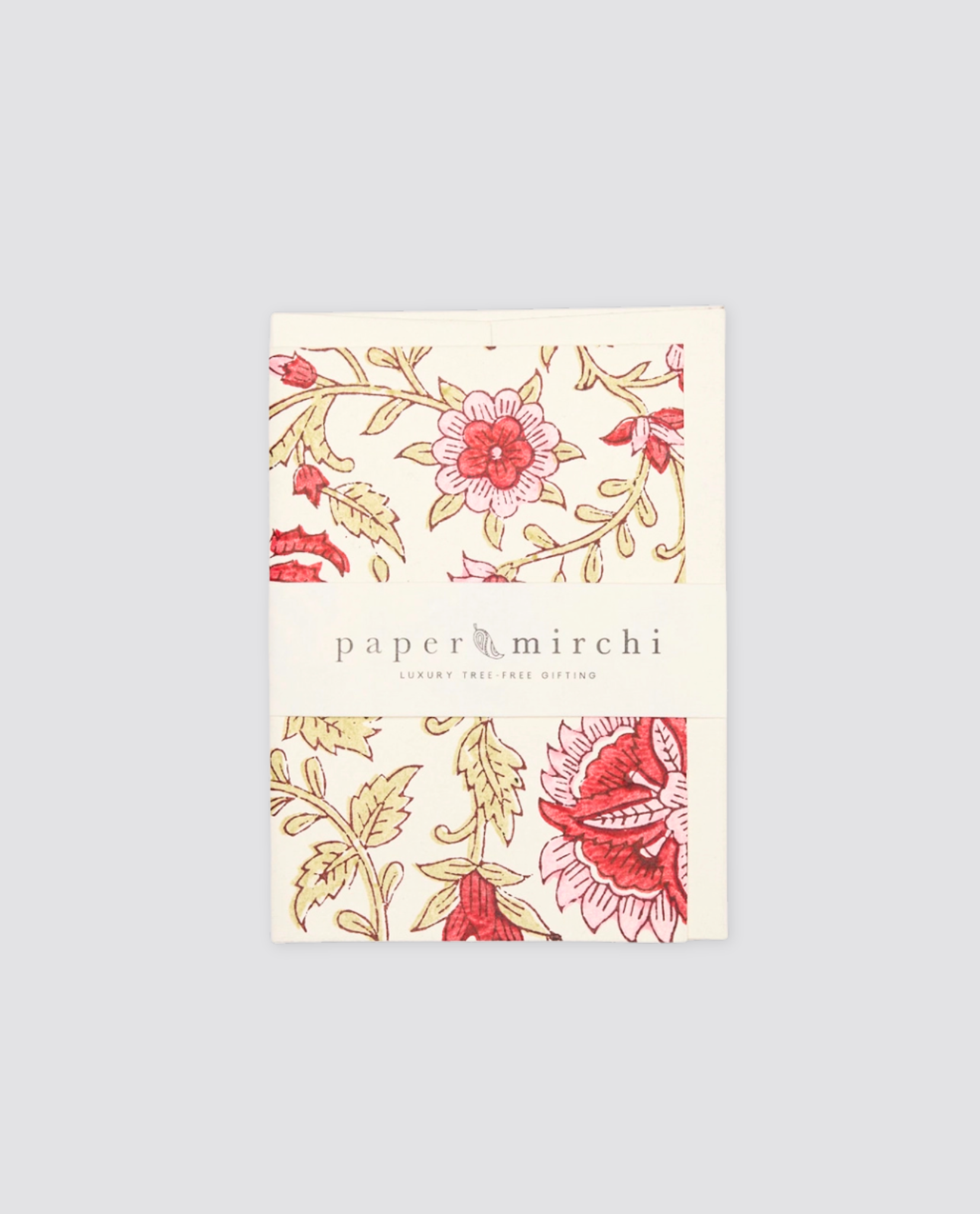 Hand block printed greetings card featuring a vintage-style floral design in soft red and cream tones, crafted with natural, sustainable materials.