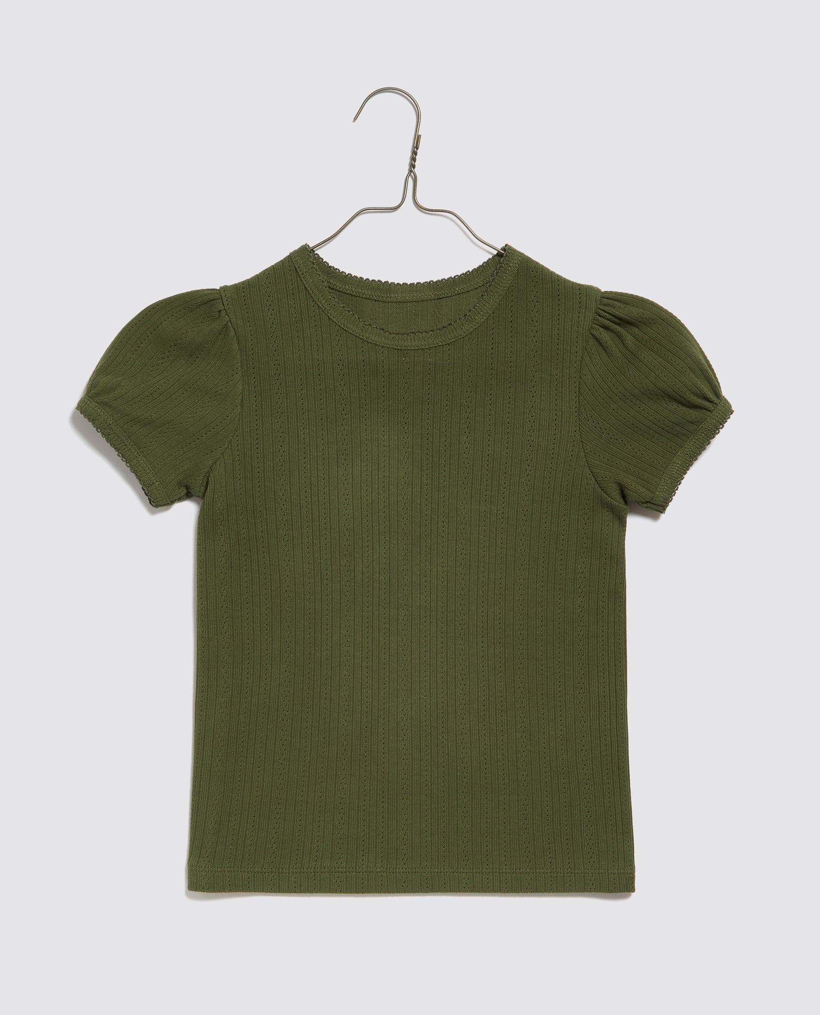 Green organic cotton t-shirt for children with delicate pointelle detailing and soft puffed sleeves, designed in a vintage style with sustainable, ethical care.