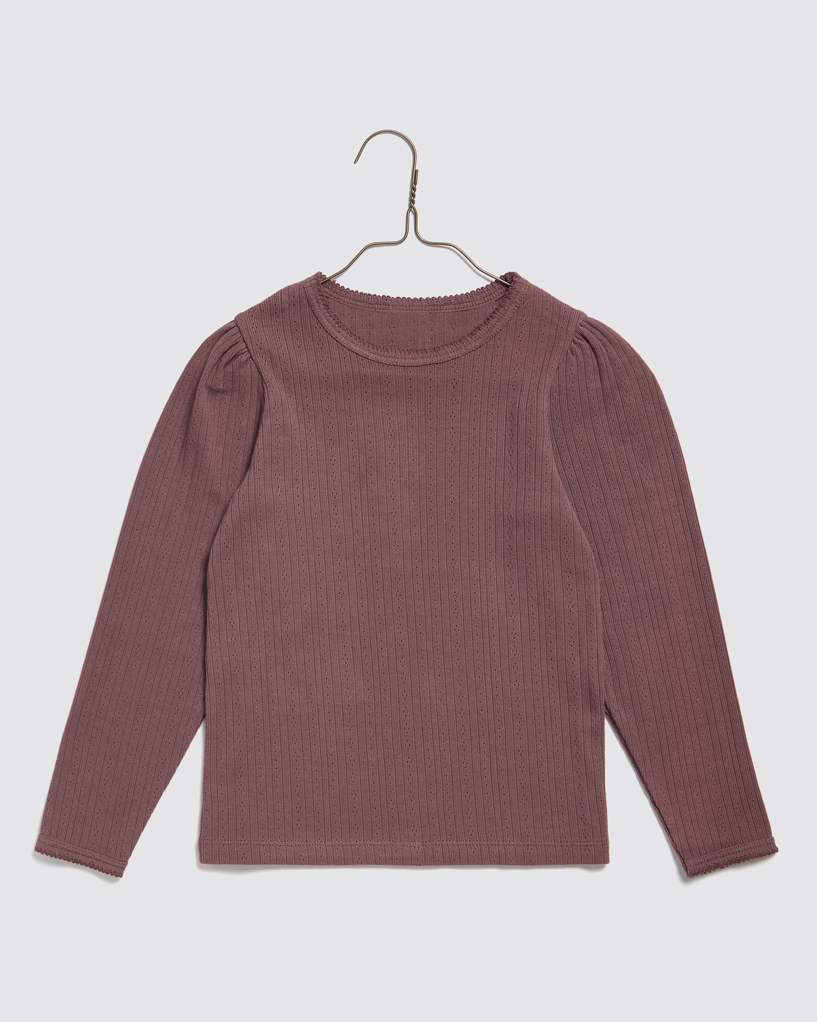 Purple organic cotton long-sleeve girls T-shirt with subtle pointelle texture, featuring a vintage-inspired style and ethical, sustainable design for childhood comfort.