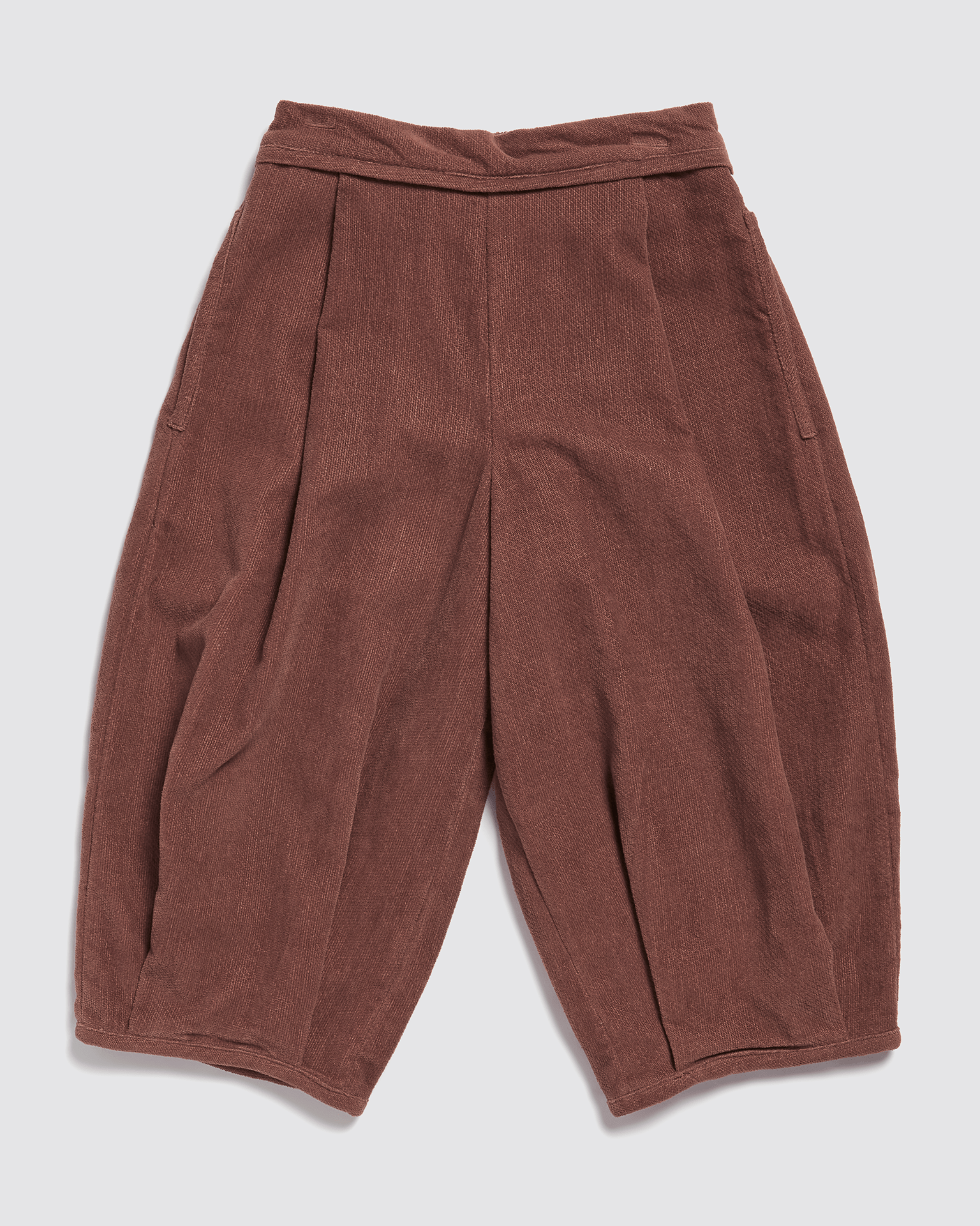 Soft nutmeg-colored velvet trousers for children, made from organic cotton with a vintage-inspired design, crafted ethically for sustainable kids clothing.