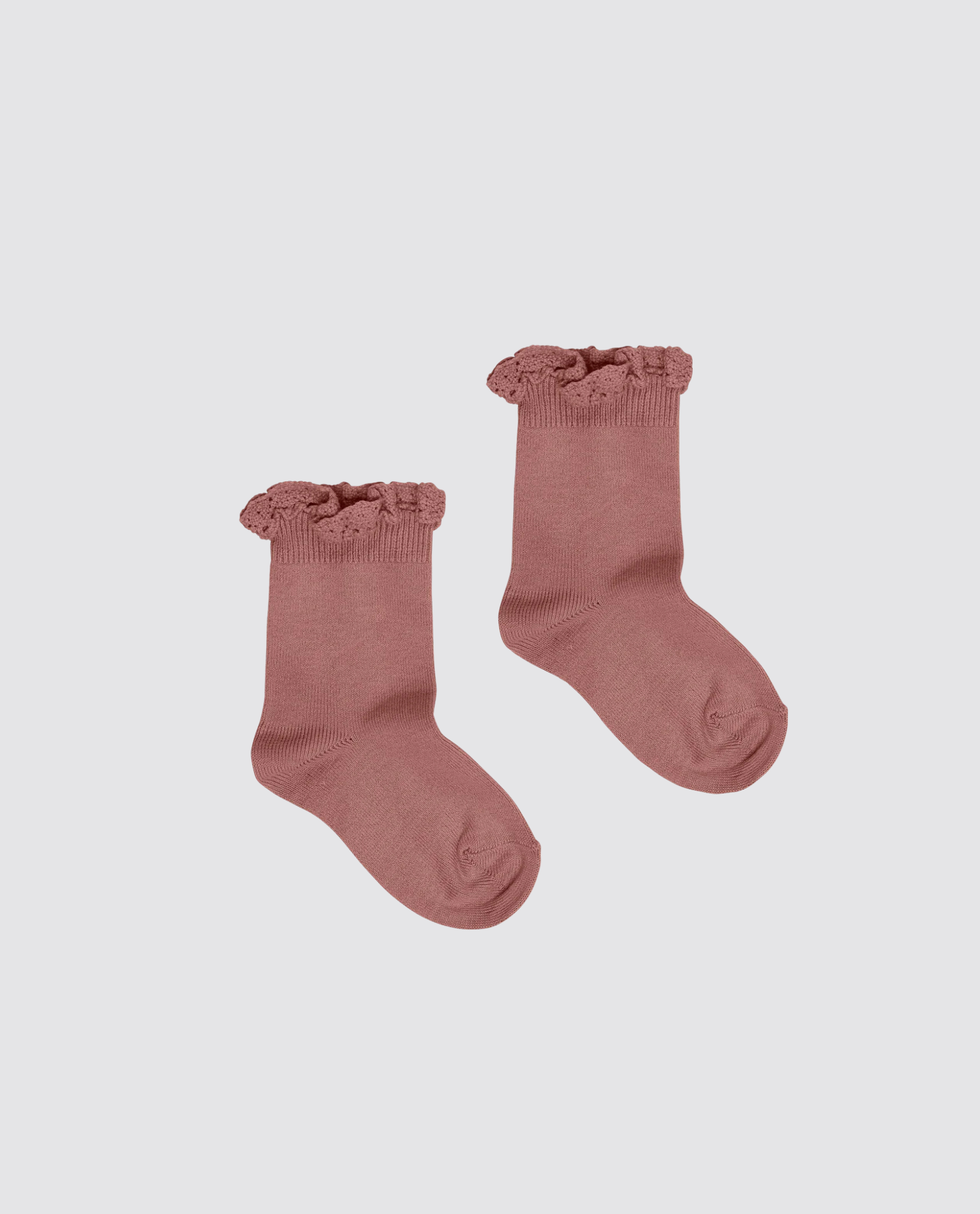 Pair of brown cotton blend ankle socks for kids with delicate lace frill detail, crafted in a vintage style by a sustainable, ethical children’s clothing brand.