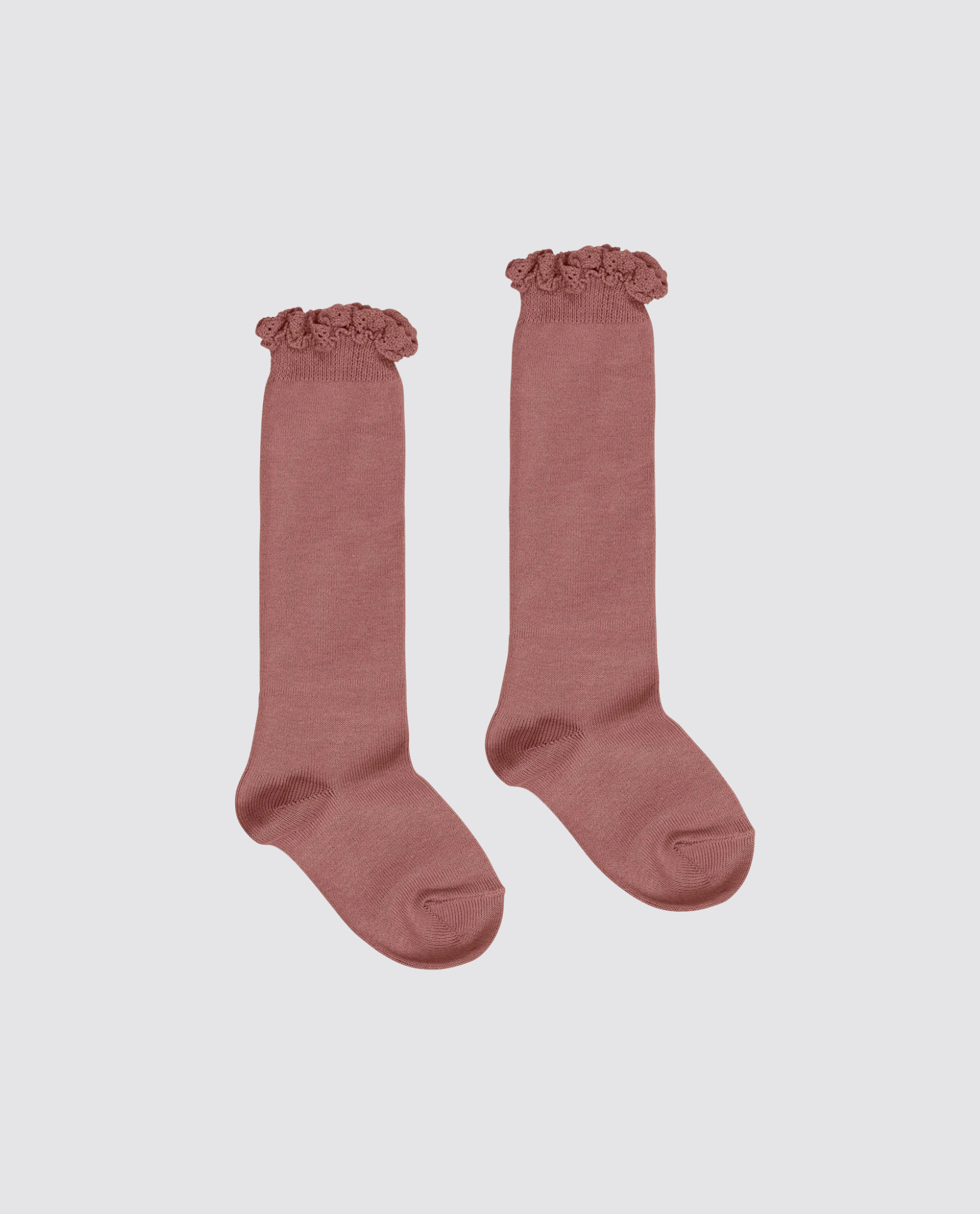 Pair of brown cotton blend knee-high socks for kids with delicate lace frill detail, designed in a vintage style focused on natural and ethical children’s clothing.