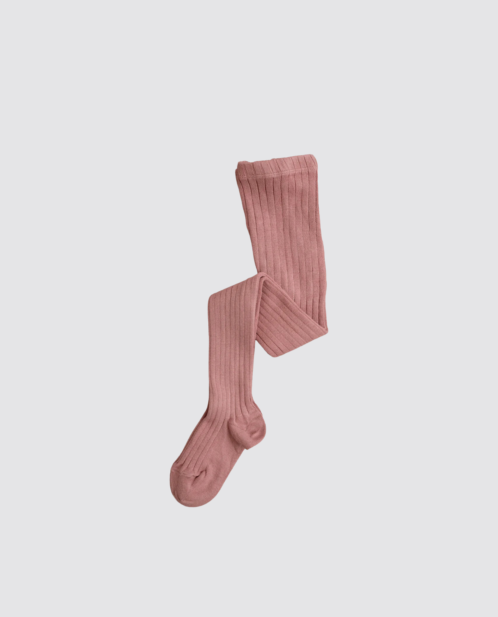 Soft ribbed tights in warm terracotta, made from natural materials for comfortable, sustainable vintage-inspired children's clothing.
