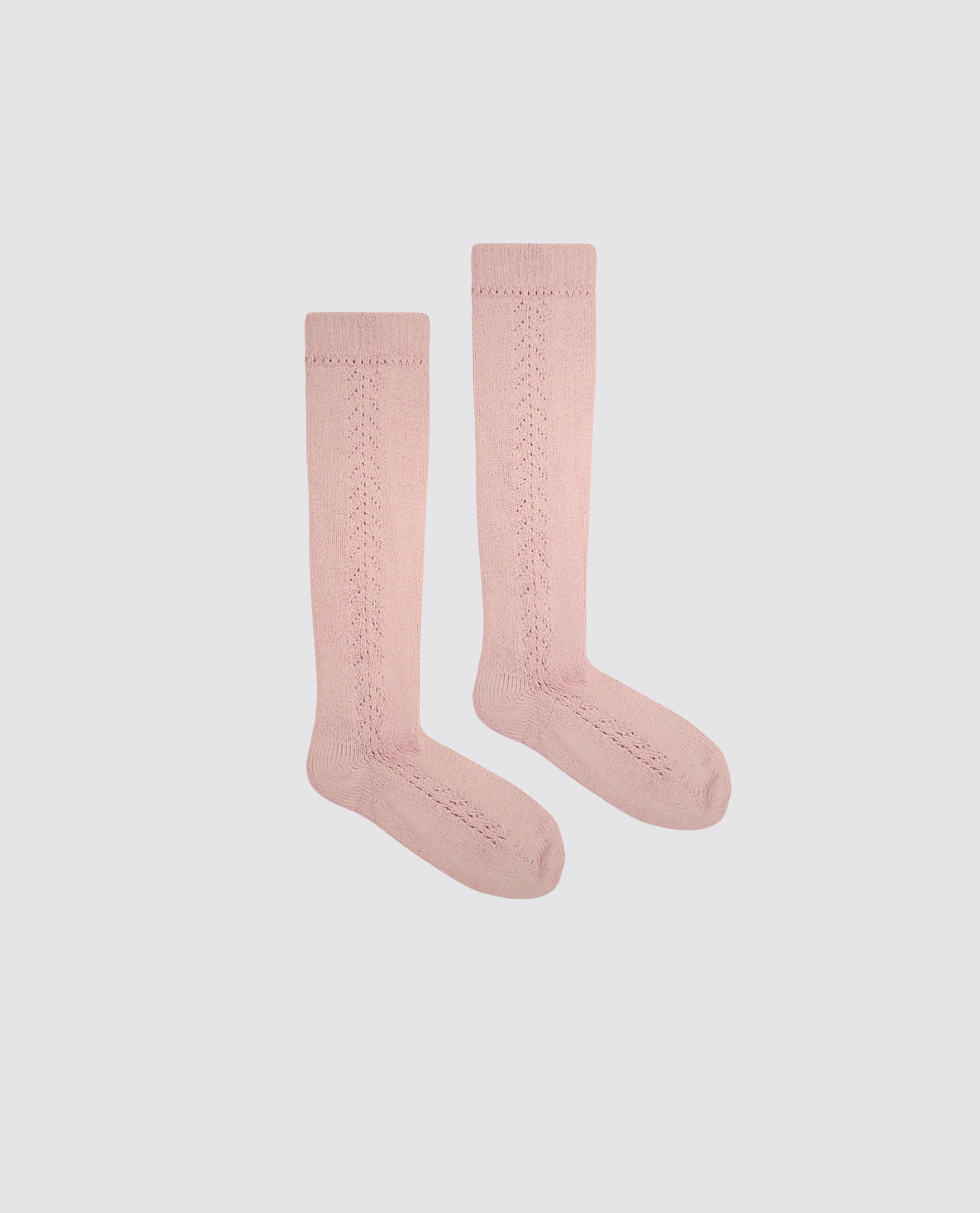 Pair of pink openwork knee high socks for kids made from a soft cotton blend, featuring a vintage-inspired design in an ethical and sustainable style.
