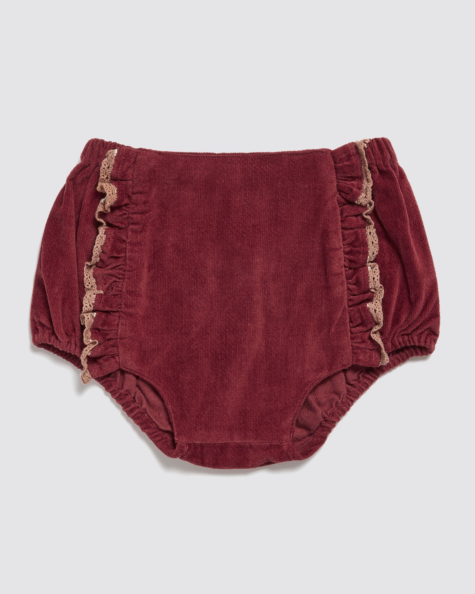 Vintage style girls bloomer in deep red velvet with delicate beige lace trim, made from organic cotton, offering sustainable and ethically crafted children's clothing.