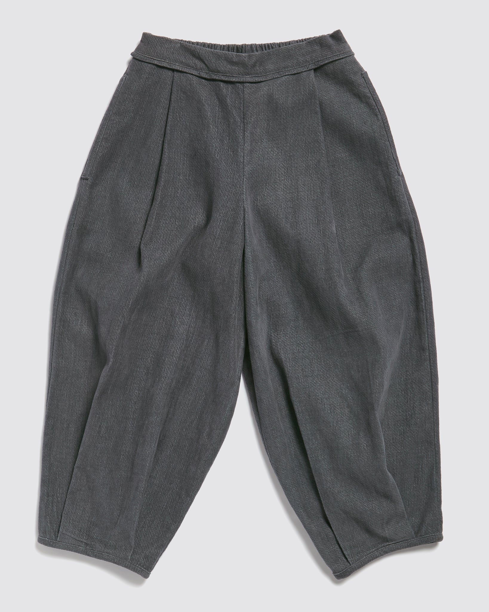 Children's vintage style trousers made from soft organic cotton velvet in deep juniper blue, designed with a relaxed fit for comfort and slow, ethical fashion.