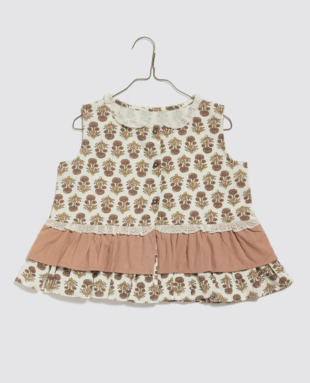 A pretty, sleeveless, floral sun-top with contrasting peplum frill and cotton lace trims, including a delicate cotton lace collar. 