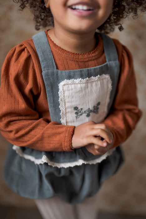 Beautiful blue velvet baby romper with embroidery and pretty trims. Sustainably made in soft organic cotton 3.