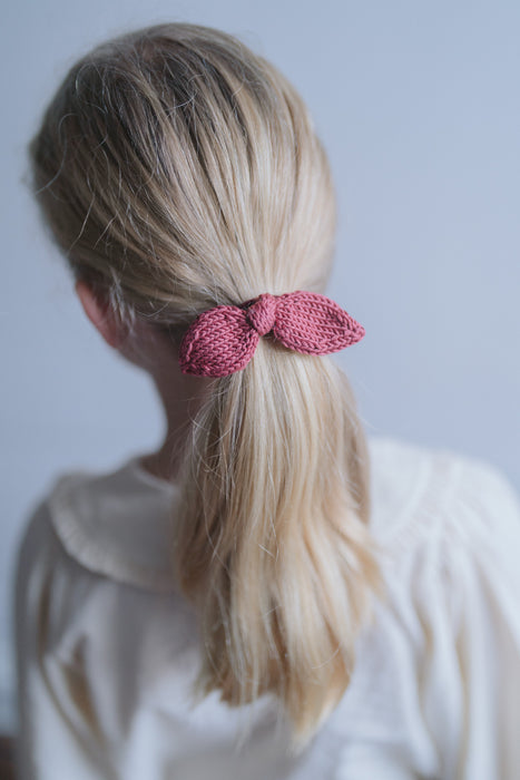 Hand knitted hair bow in berry - Theodore Children