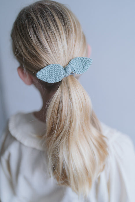 Hand knitted hair bow in sea green - Theodore Children