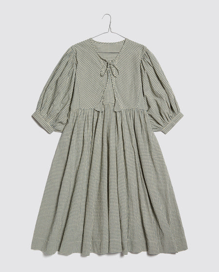 Full ladies boho style summer smock dress in a woven check with full flowing skirt and billowing sleeves.  Perfect for everyday and special occasions and comes with matching girls dress for little me twinning.   