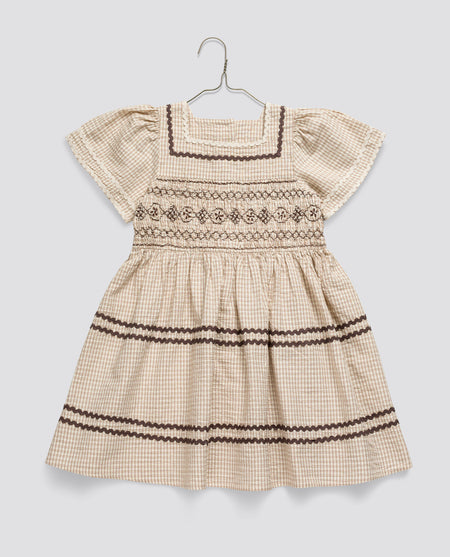 Beautiful girl's dress in vintage inspired check pattern with short sleeves and square neck line. Perfect for every day play or occasion wear.
