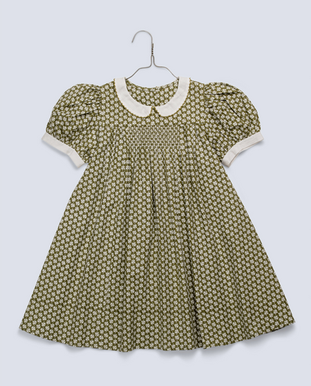 Beautiful green floral girl's dress with short sleeves, peter pan collar and smocking. Ethically made in organic cotton.