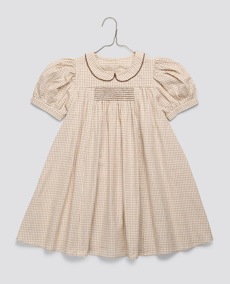 Beautiful vintage inspired dress with short sleeves and smocking. Made with organic cotton for girls, suitable for play or occasion wear.