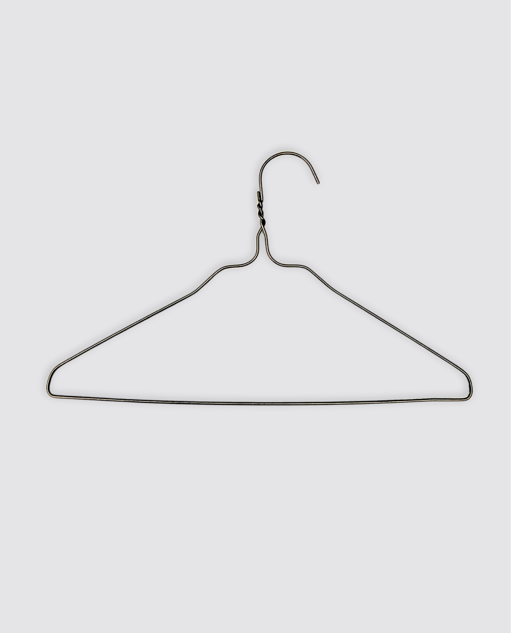 Gray metal children's hanger with a simple vintage-inspired design, perfect for organizing organic and ethically made vintage style kids clothing.