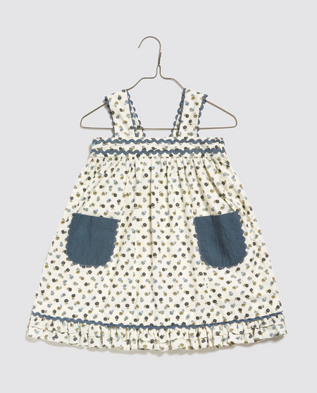 A beautiful girl's children's pretty cotton vintage inspired sundress, perfect for a party, wedding or everyday. Ditsy floral print with blue patch pockets and ric rac trim.  Perfect for parties, weddings and everyday summer wear.  100% Cotton 