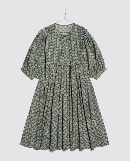 Full ladies boho style summer smock dress in block print inspired floral with full flowing skirt and billowing sleeves.  Perfect for everyday and special occasions.  