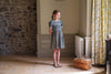 Our timeless, vintage inspired Orla Dress has been made in our organic cotton thistle floral fabric. This pretty children's dress is perfect for special occasions or everyday wear. It has beautiful hand smocking over a gathered bodice, full, puffed sleeves with contrasting cuffs and a contrasting Peter Pan collar. Designed for comfort and style, the full skirt allows for easy movement, it's sure to become a favourite for little girls and looks so sweet with little vintage style leather sandals. 