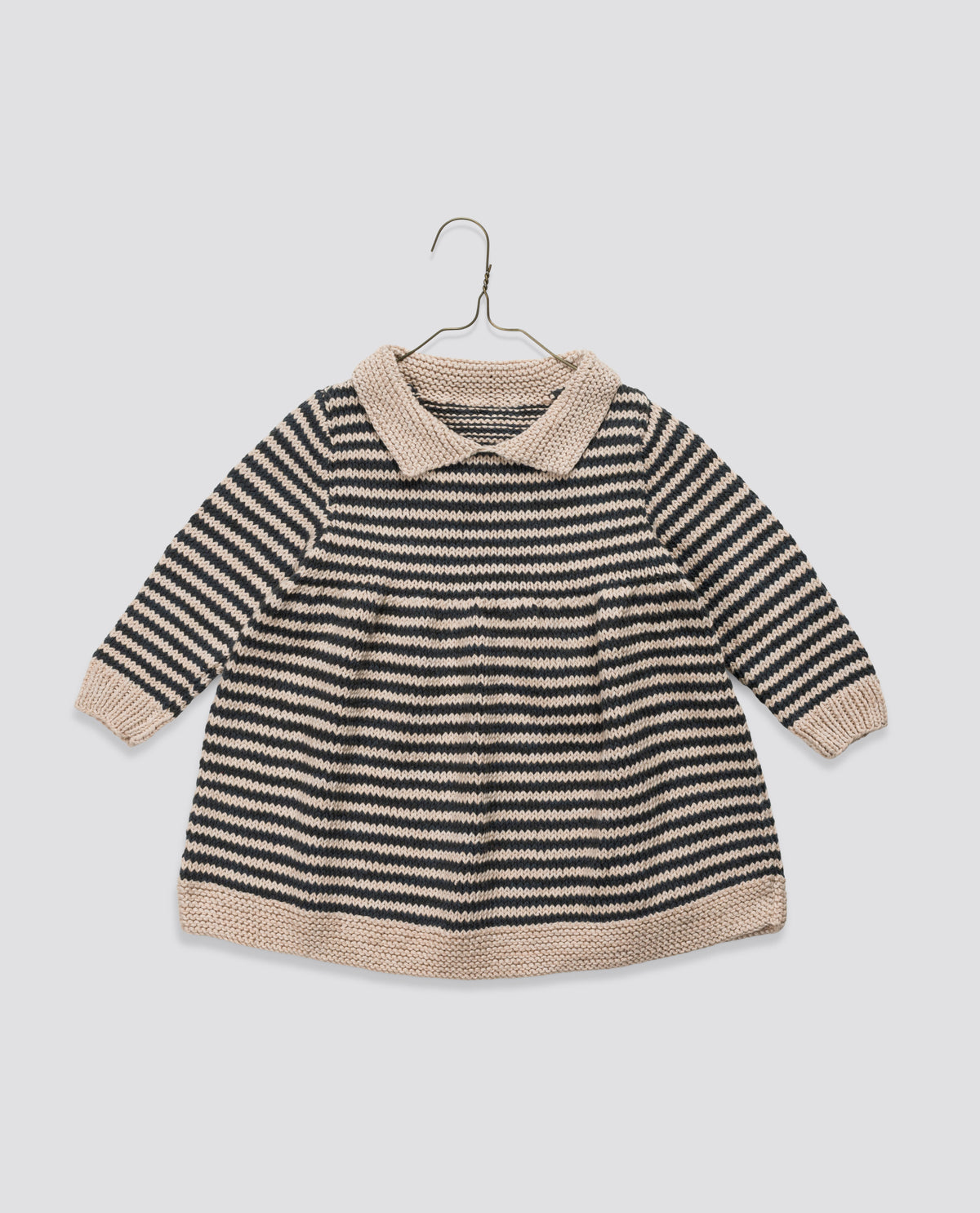 Classic hand knit long sleeve dress in vintage-style design, ethically and sustainably made for children's clothes.
