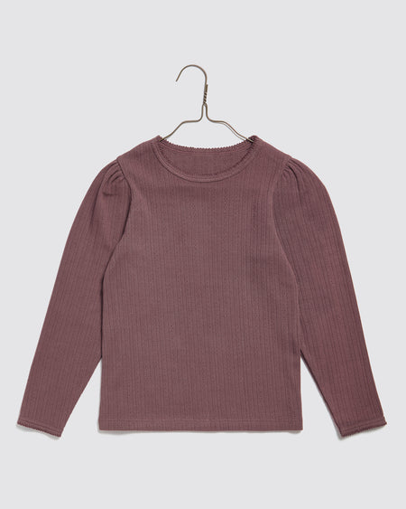 Organic, pointelle jersey, long sleeved girls t shirt in purple grape colour. Round neck, slim fitting gathered sleeve heads. 100% organic cotton plain t shirt.