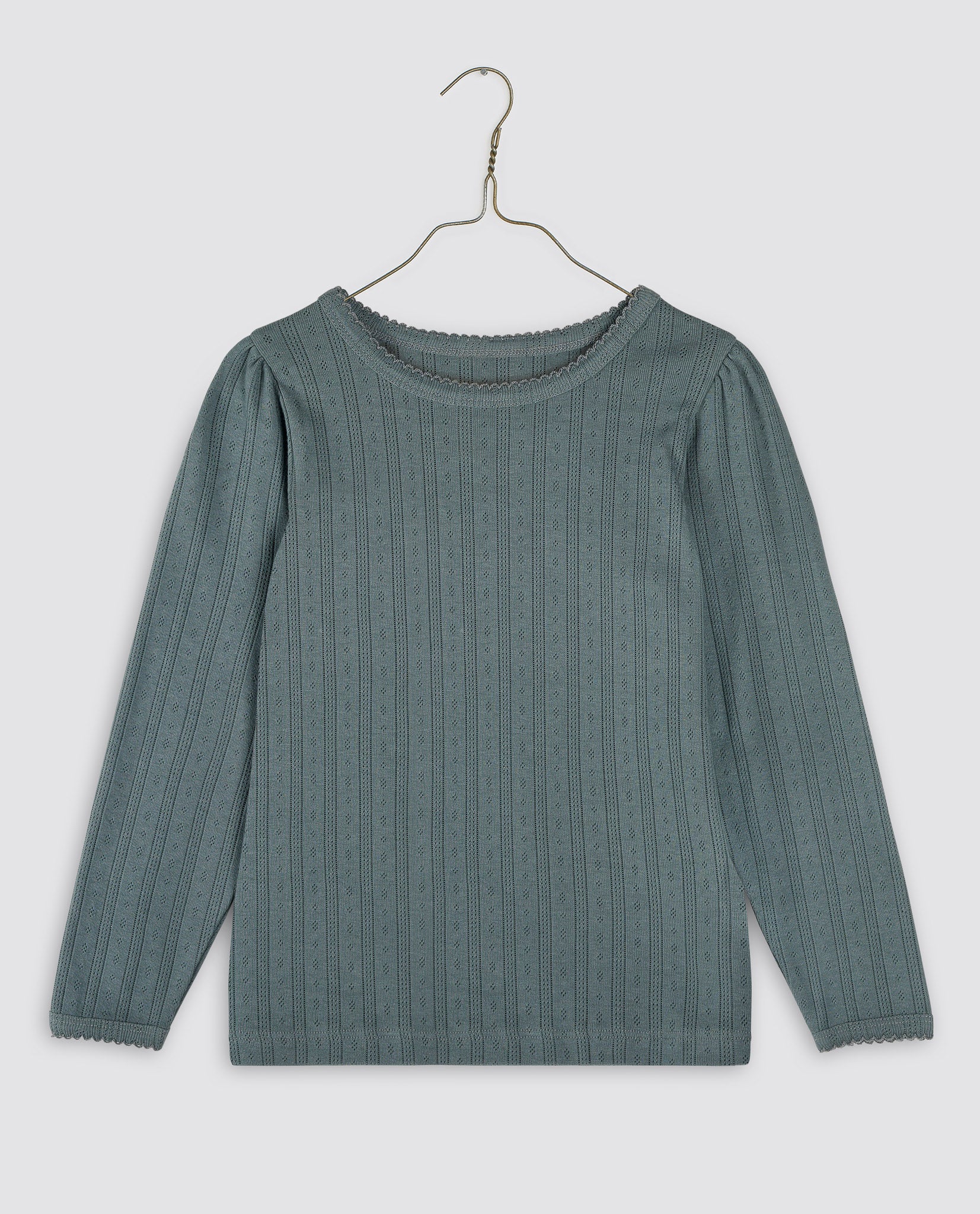 Long-sleeve kids cotton tee in muted slate blue with delicate pointelle knit pattern, designed with vintage style and sustainable, organic materials for gentle childhood wear.