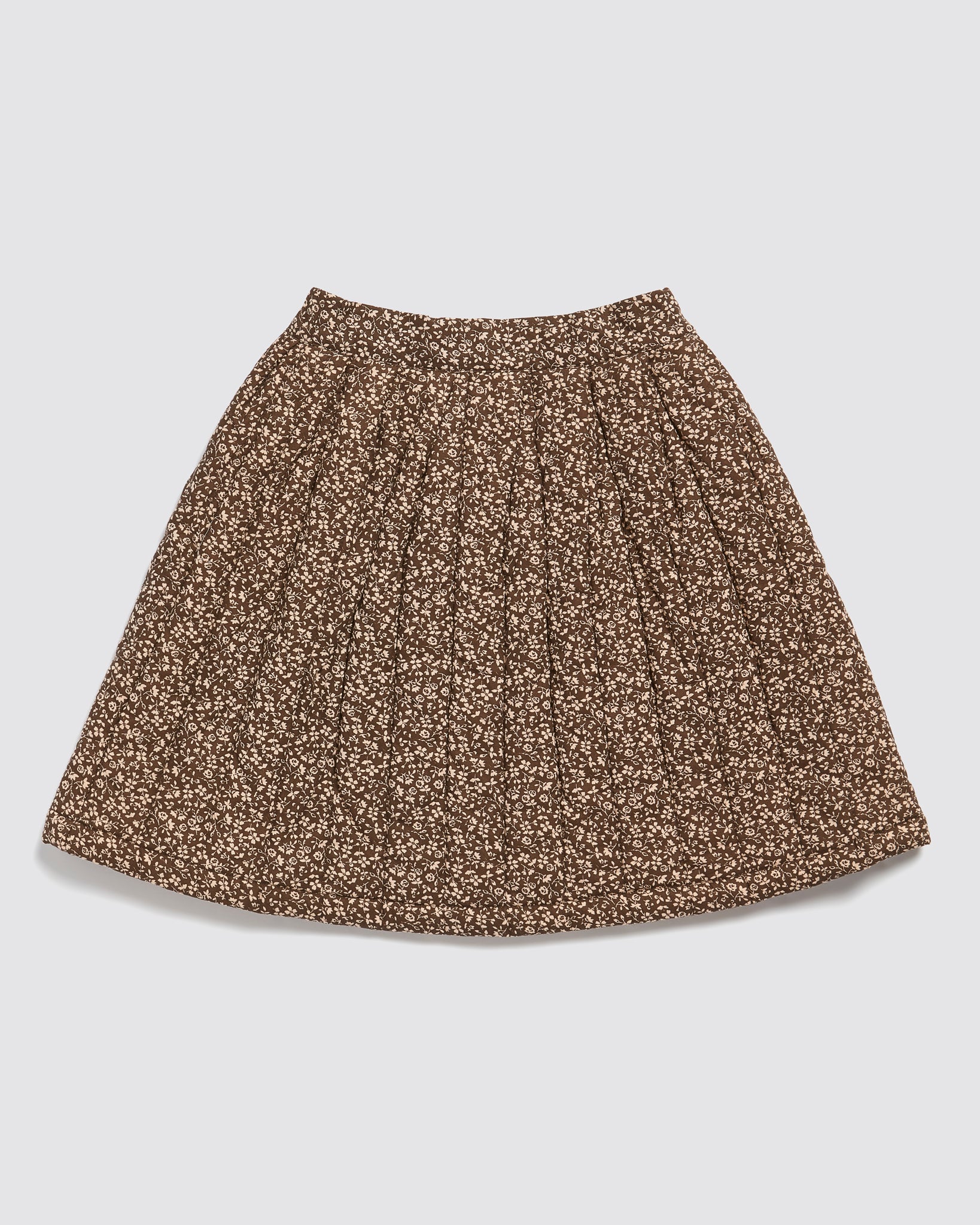 Brown and beige floral patterned puff skirt for kids made from organic cotton, featuring a vintage style and sustainable, ethical craftsmanship.