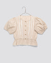 Girls vintage style blouse in soft straw check cotton with puff sleeves and button front, made from organic, sustainable materials for ethical children's clothing.