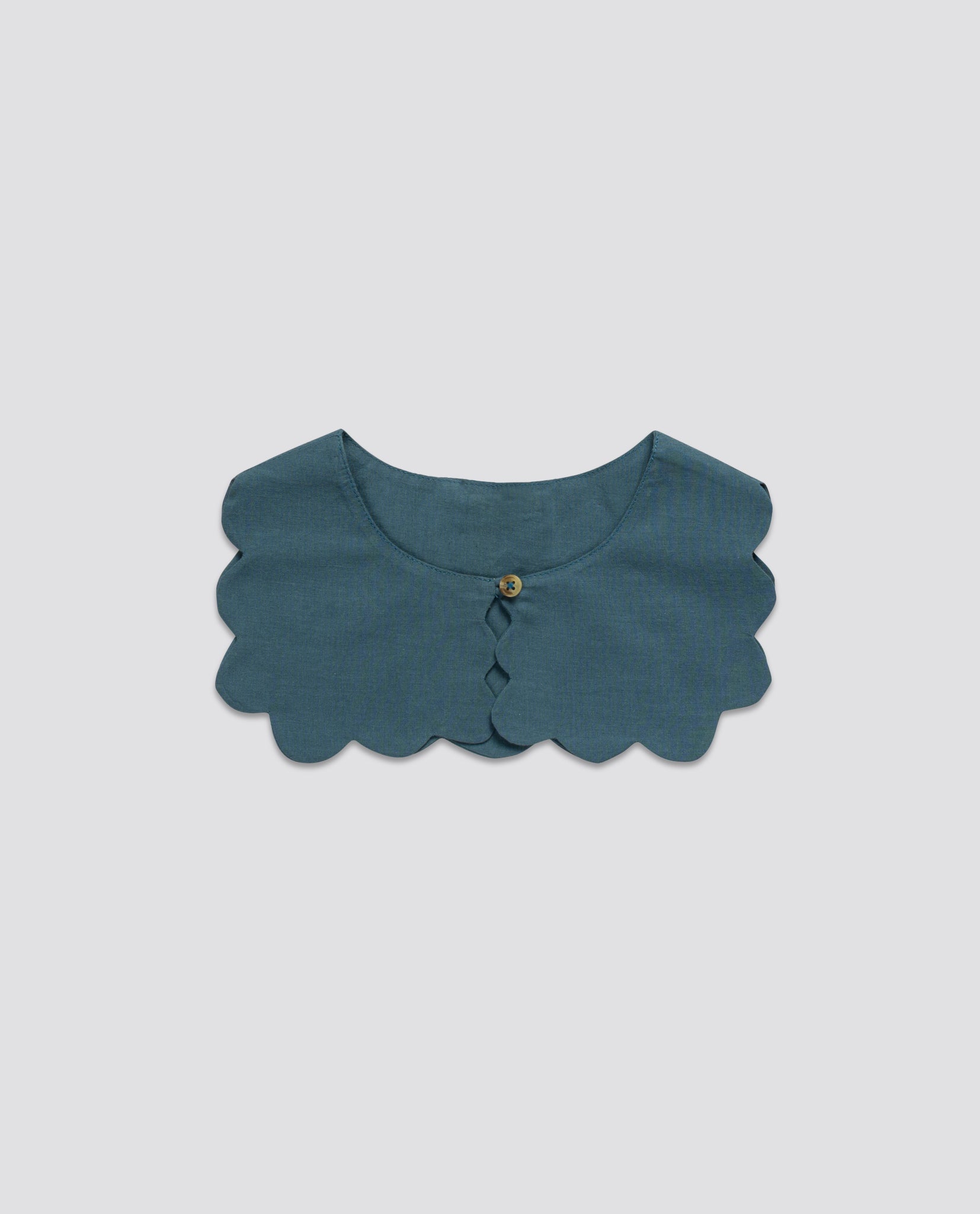 Scalloped organic cotton collar in pier blue, featuring a charming vintage-inspired style, ethically made for a slow, natural children's clothing brand.