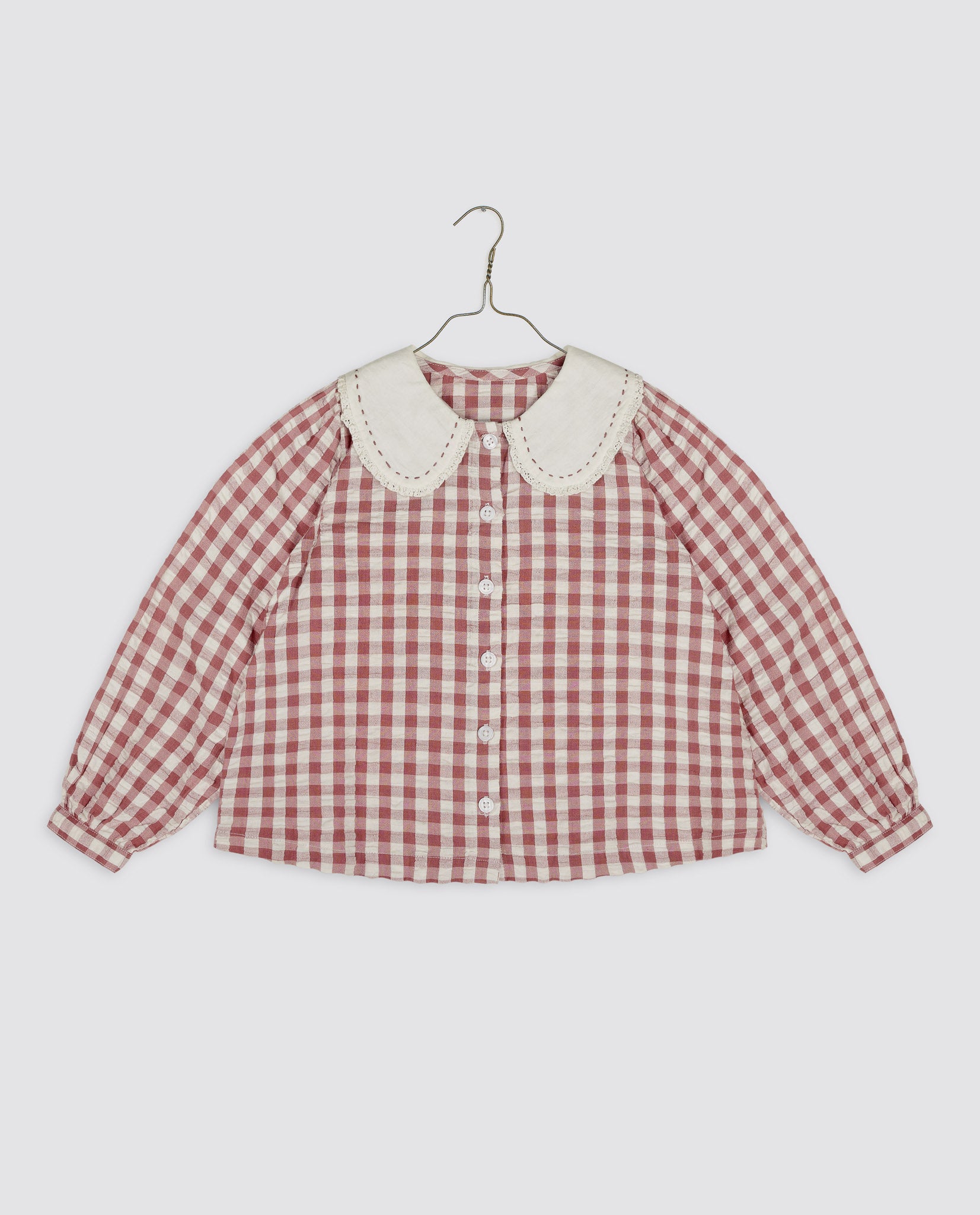 Girls cotton blouse in white and red gingham with a vintage style rounded collar, made from organic materials for sustainable children's clothing.