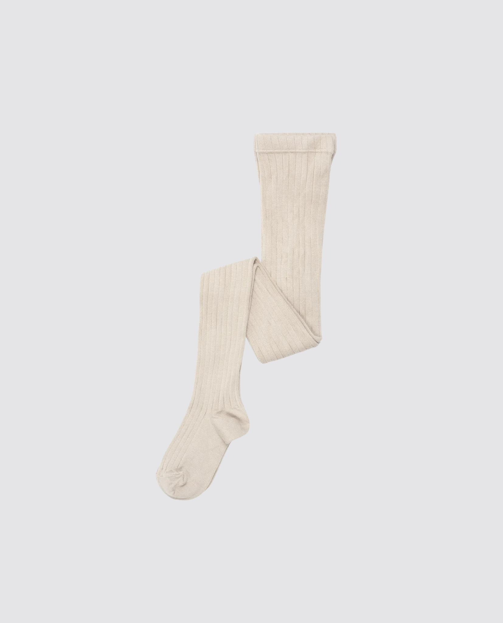 Soft natural-colored ribbed tights for children made from organic cotton, designed with a vintage style, perfect for ethically made sustainable kids clothing.