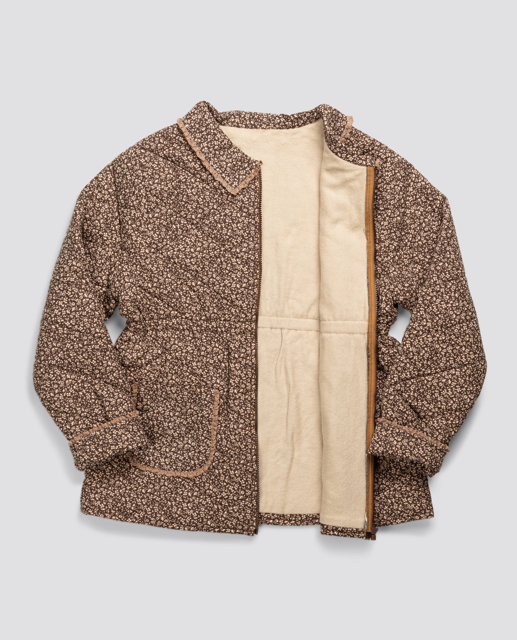 Brown floral organic cotton jacket with beige soft lining, featuring vintage-inspired style and sustainable, ethically made craftsmanship for women.