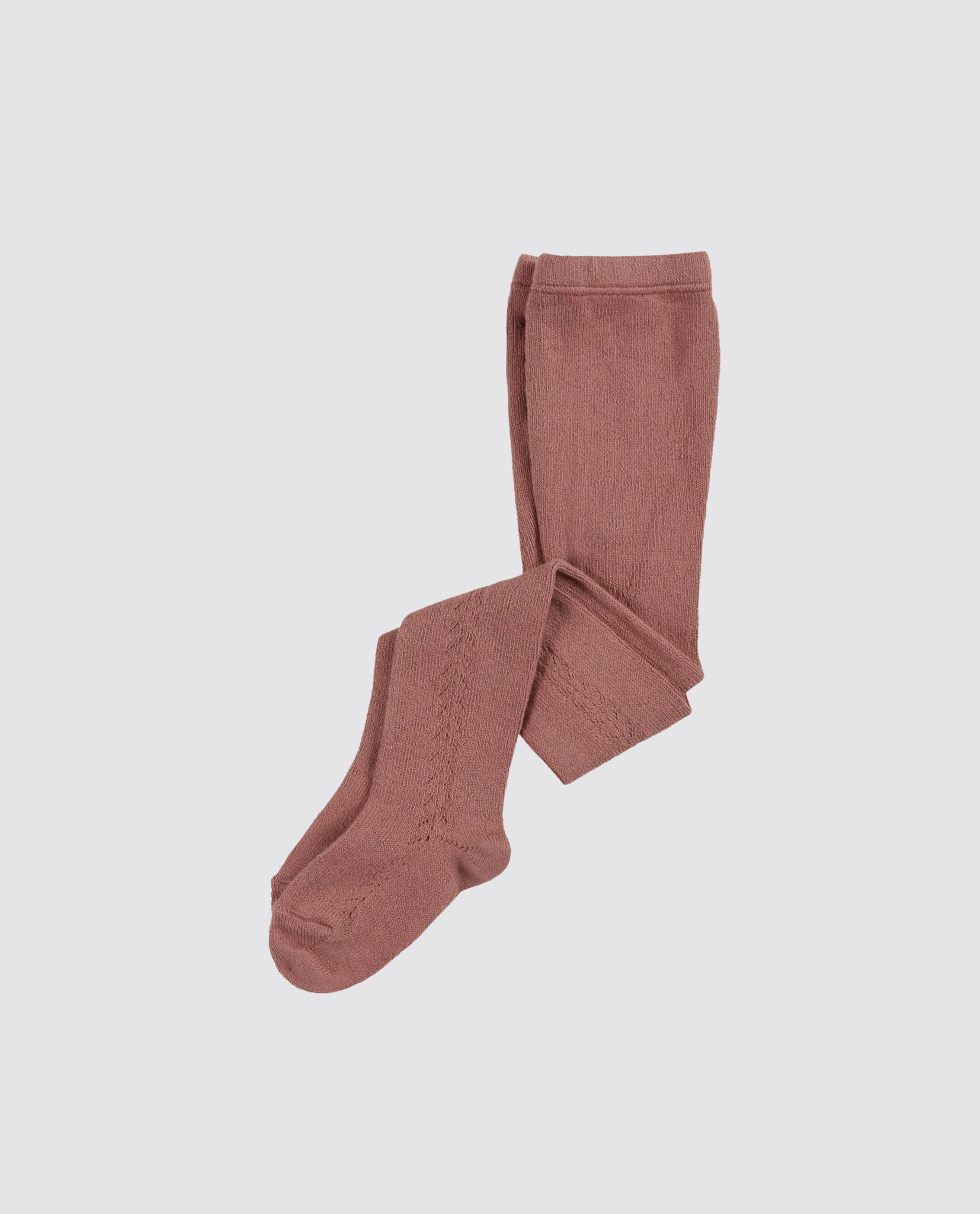 Brown cotton blend children’s tights with a delicate openwork pattern, designed for a vintage style and made with sustainable, ethical materials.