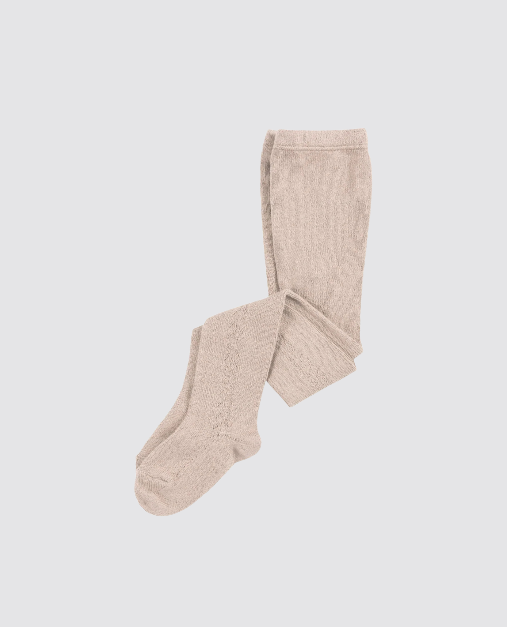 Beige openwork tights made from a soft cotton blend, featuring a delicate vintage-inspired knit pattern, perfect for sustainable children's clothing.